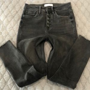 Black washed raw hem jeans